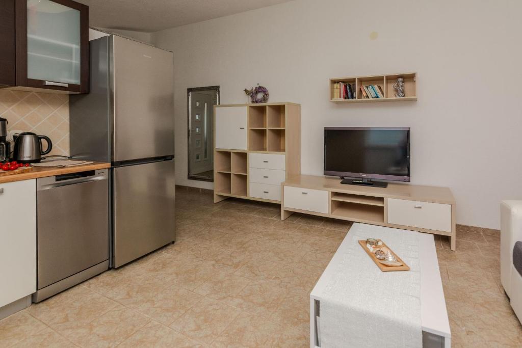 Kuchyňa alebo kuchynka v ubytovaní Apartments Tukara