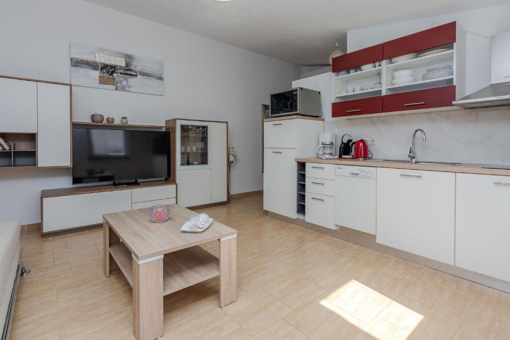 Kuchyňa alebo kuchynka v ubytovaní Apartments Tukara