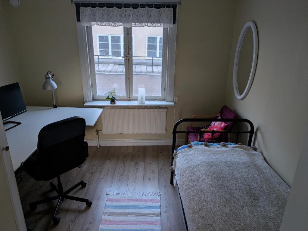 Postel nebo postele na pokoji v ubytování Hostel Räntmästaregården