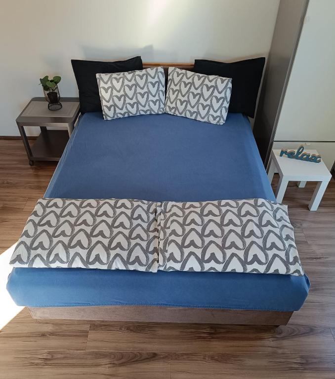 A bed or beds in a room at Studio Tara Divčibare