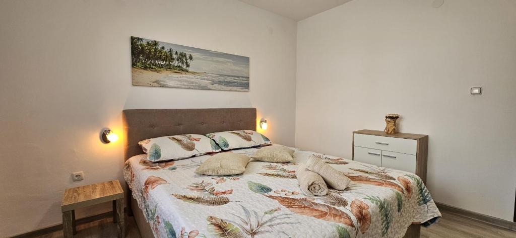 Postel nebo postele na pokoji v ubytování Apartment Nika