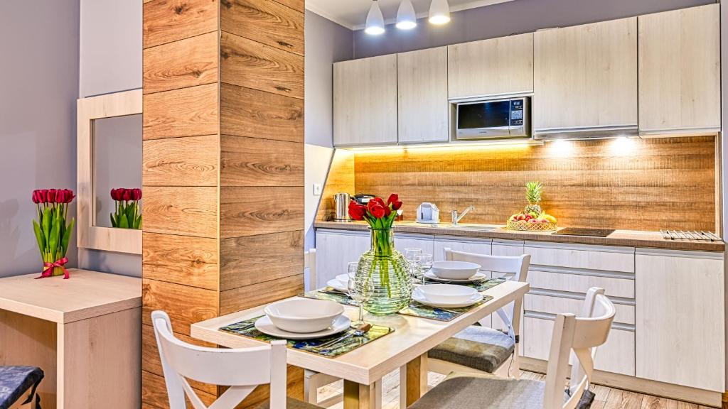 Kuchyňa alebo kuchynka v ubytovaní Apartamenty Sun & Snow Bawaria II