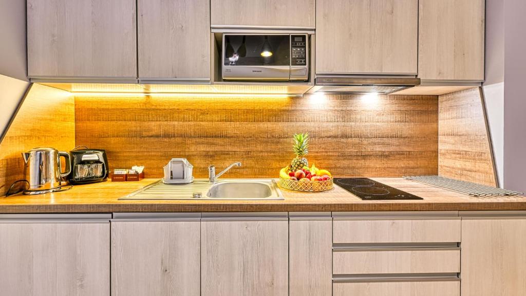 Kuchyňa alebo kuchynka v ubytovaní Apartamenty Sun & Snow Bawaria II
