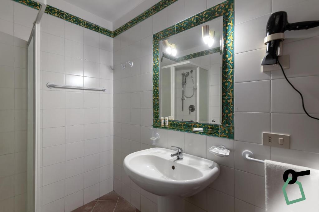 Koupelna v ubytování HOTIDAY Room Collection - Taormina