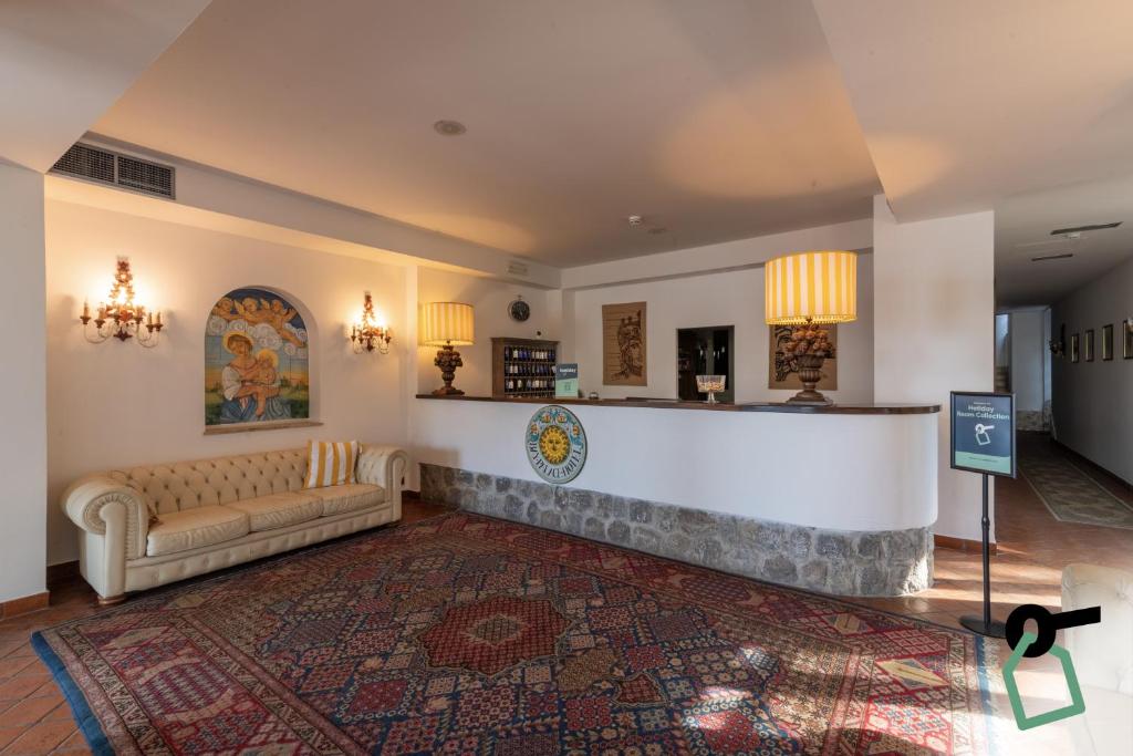 Posezení v ubytování HOTIDAY Room Collection - Taormina