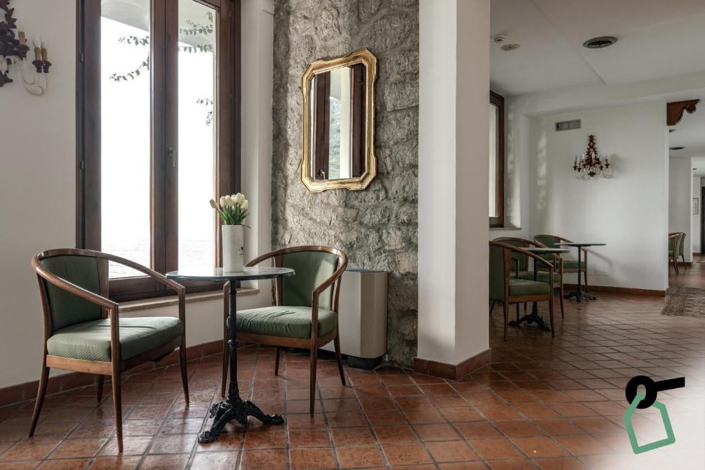 Posezení v ubytování HOTIDAY Room Collection - Taormina