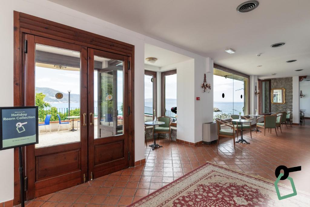 Vstupní hala nebo recepce v ubytování HOTIDAY Room Collection - Taormina