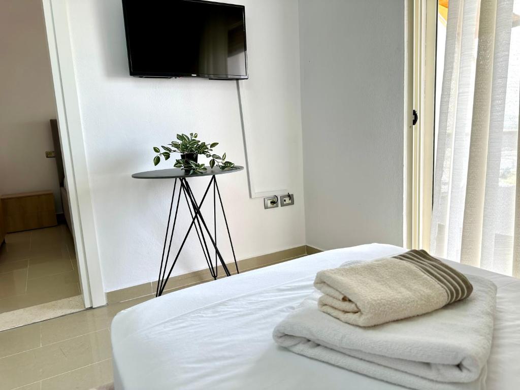 Postel nebo postele na pokoji v ubytování Shell Home golem 1