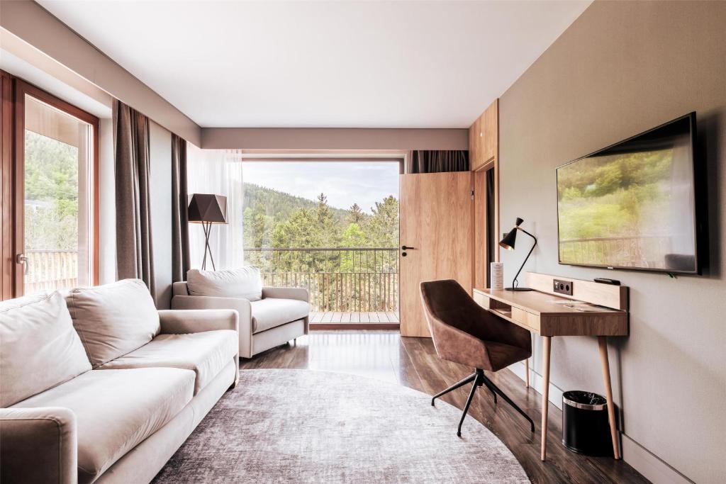 TV a/nebo společenská místnost v ubytování Radisson Hotel Szklarska Poręba