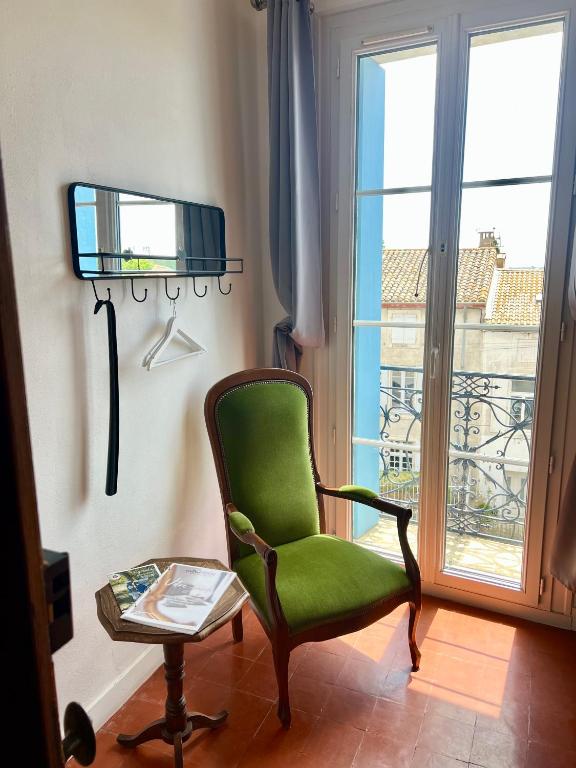 TV a/nebo společenská místnost v ubytování Entre Midi - Maison d'Hôtes - B&B