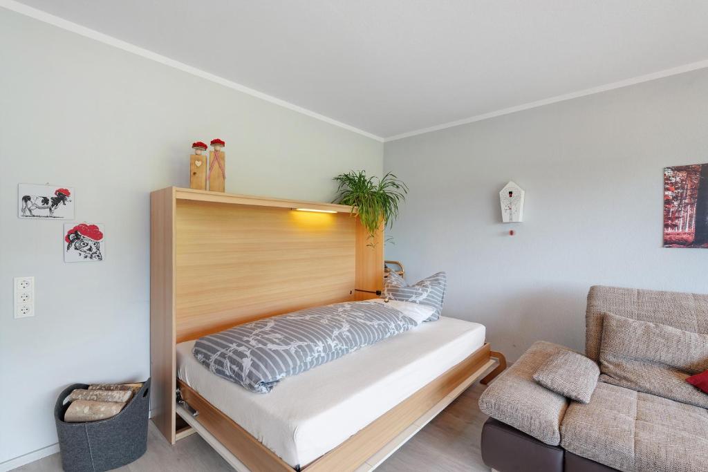Postel nebo postele na pokoji v ubytování Ferienwohnung Kuckuckslockennest