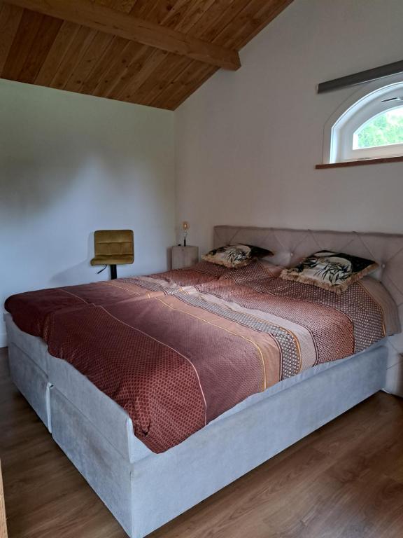 Postel nebo postele na pokoji v ubytování Het Buitenleven