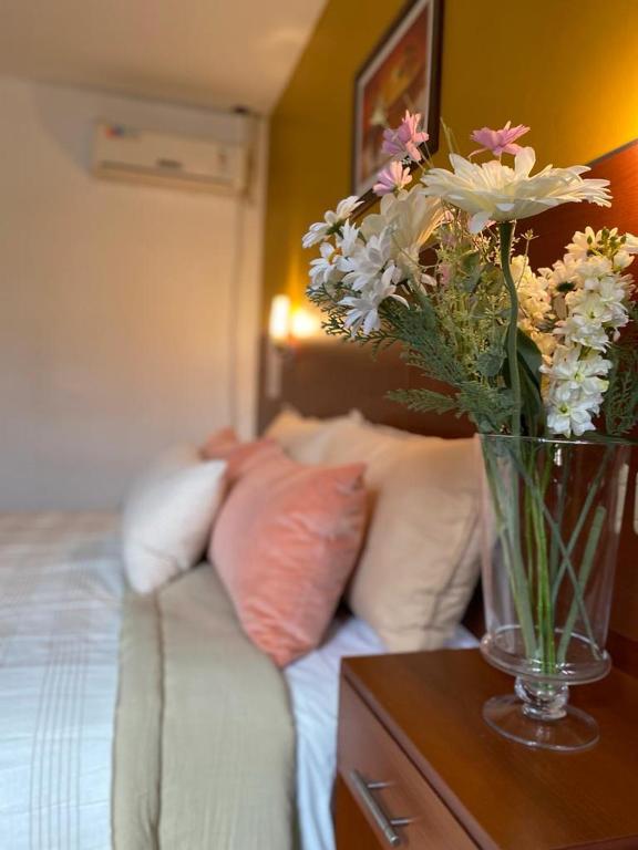 Postel nebo postele na pokoji v ubytování Hostal Alto Ayre Salta