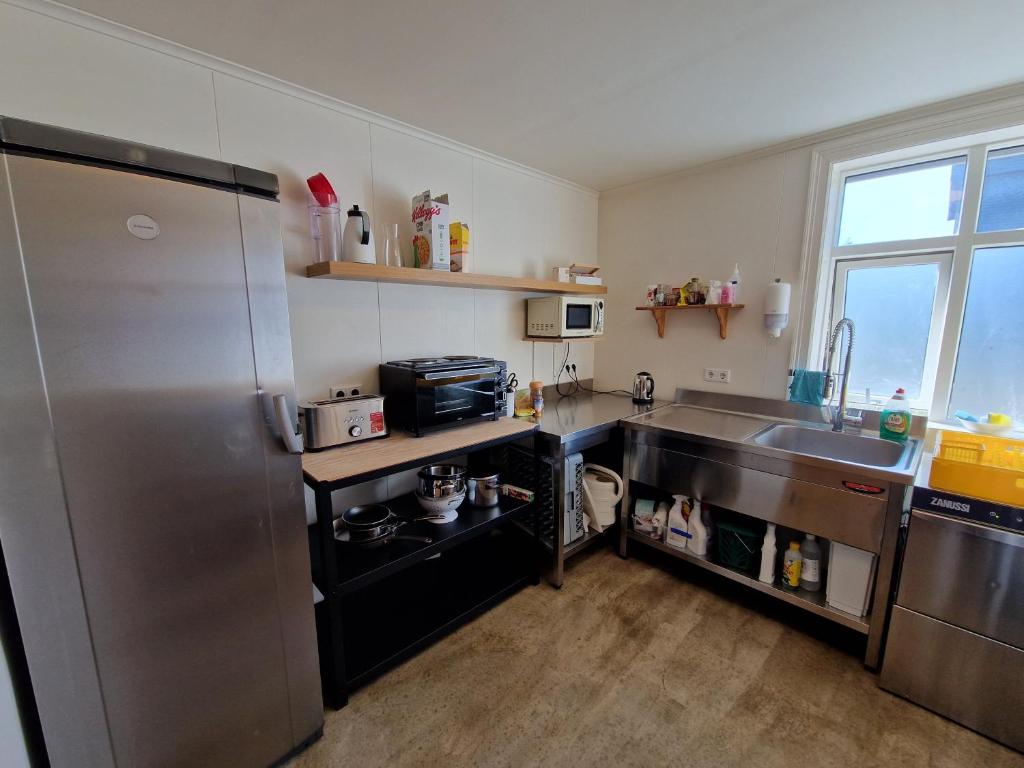 Kuchyň nebo kuchyňský kout v ubytování Guesthouse Mikael