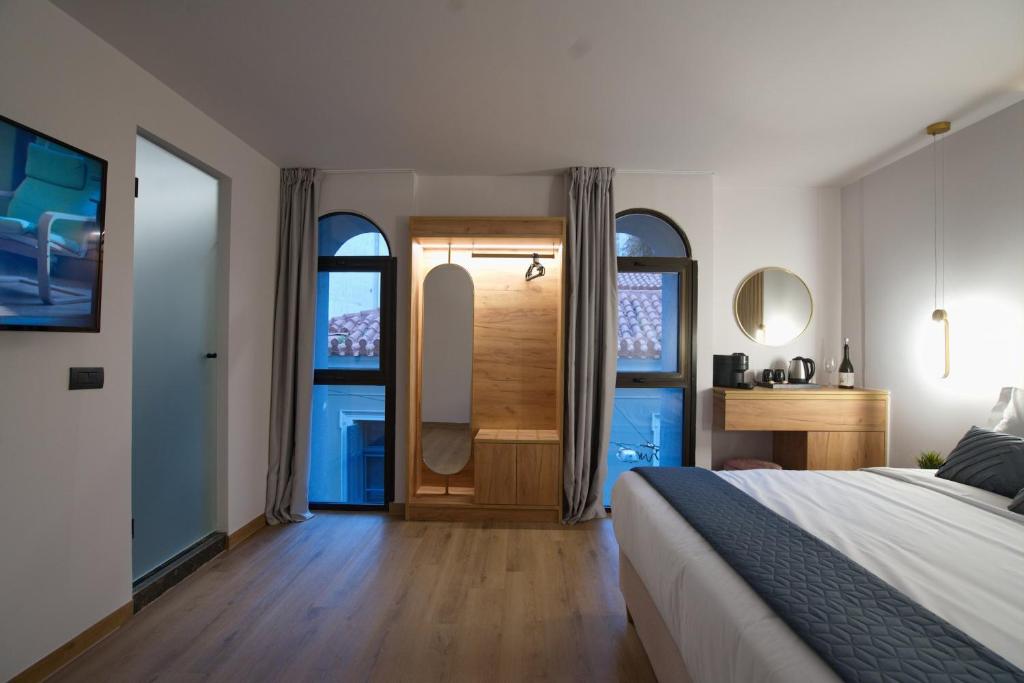 CITYLUXE Suites & Rooms - Resim 37