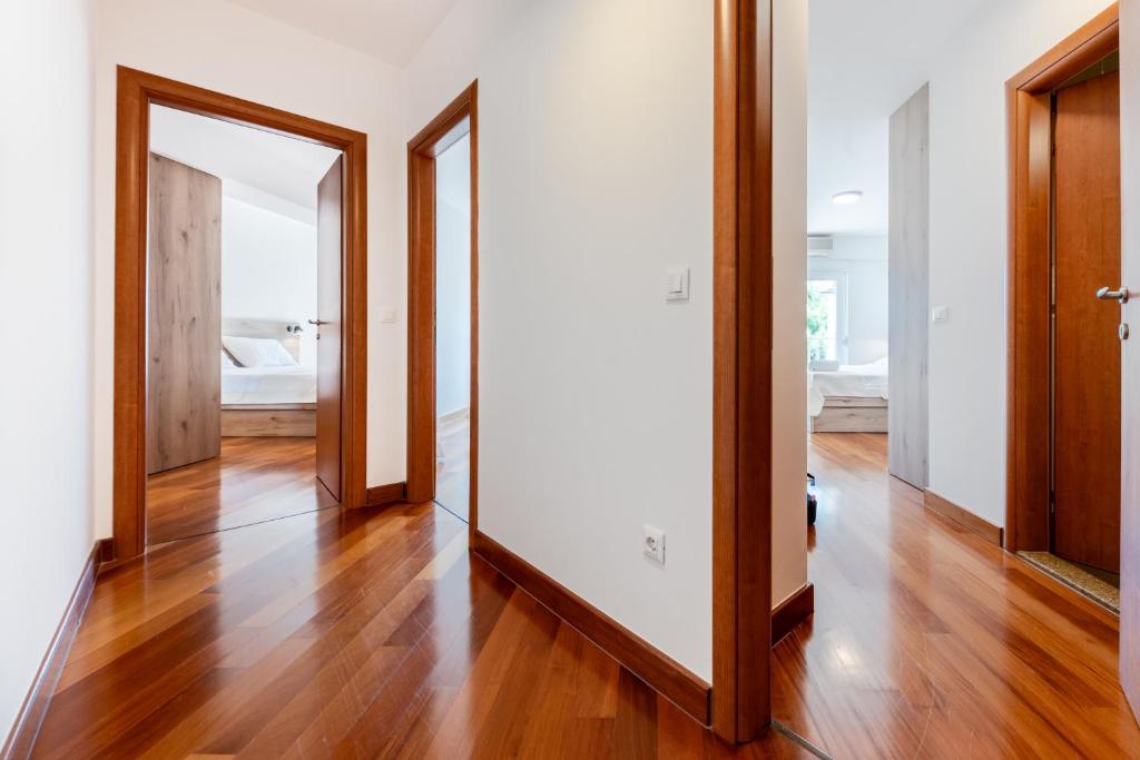 Posteľ alebo postele v izbe v ubytovaní Apartman Zdravka