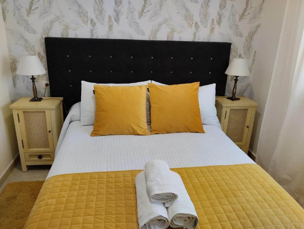 A bed or beds in a room at Casa Xarreiro