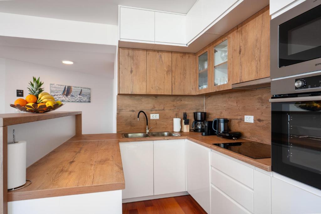 Kuchyňa alebo kuchynka v ubytovaní Apartman Zdravka