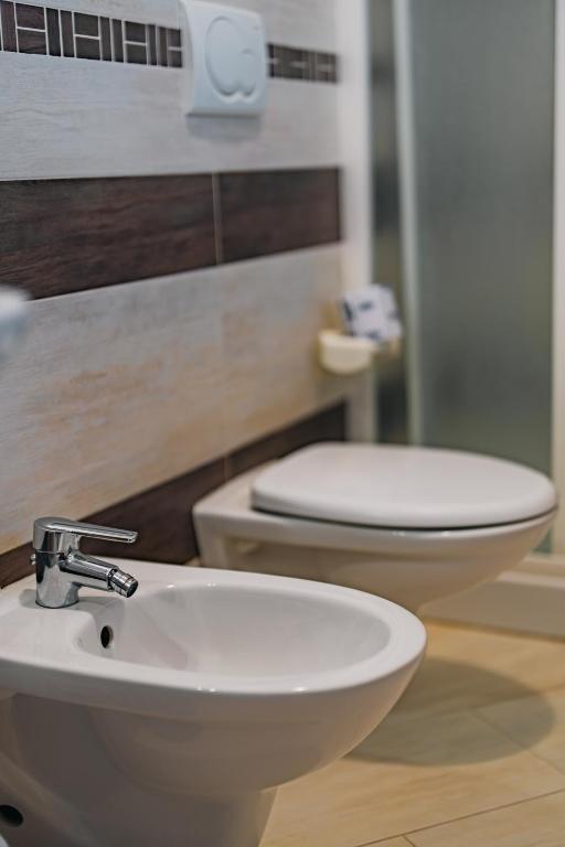 Koupelna v ubytování Albergo Settebello