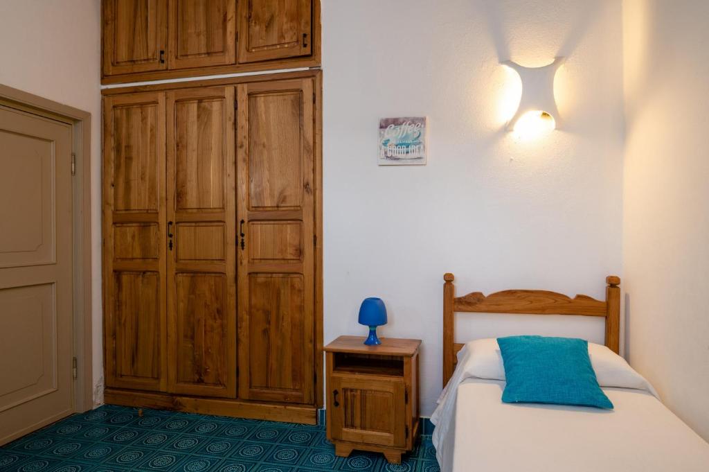 A bed or beds in a room at Villa Bados 8 - Klodge