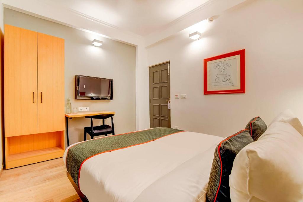 Postel nebo postele na pokoji v ubytování Hotel O Star Key