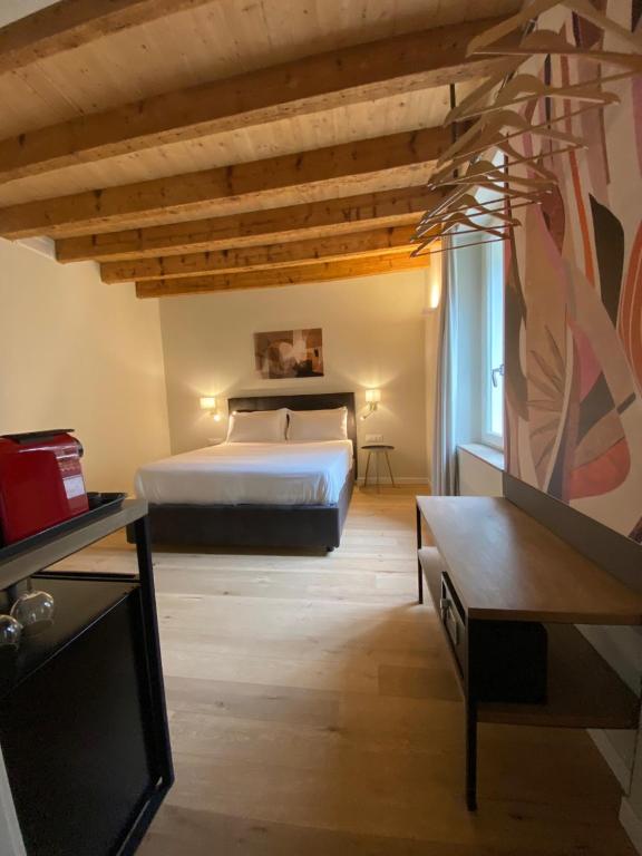 Posteľ alebo postele v izbe v ubytovaní Malvezzi24 Boutique Rooms