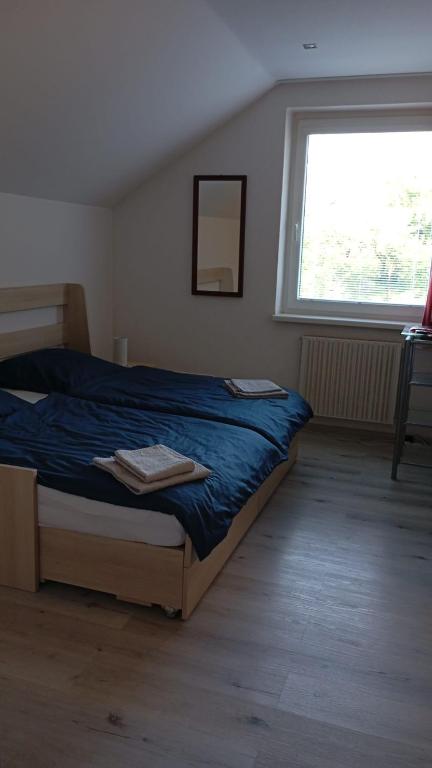 Postel nebo postele na pokoji v ubytování Penzion Era