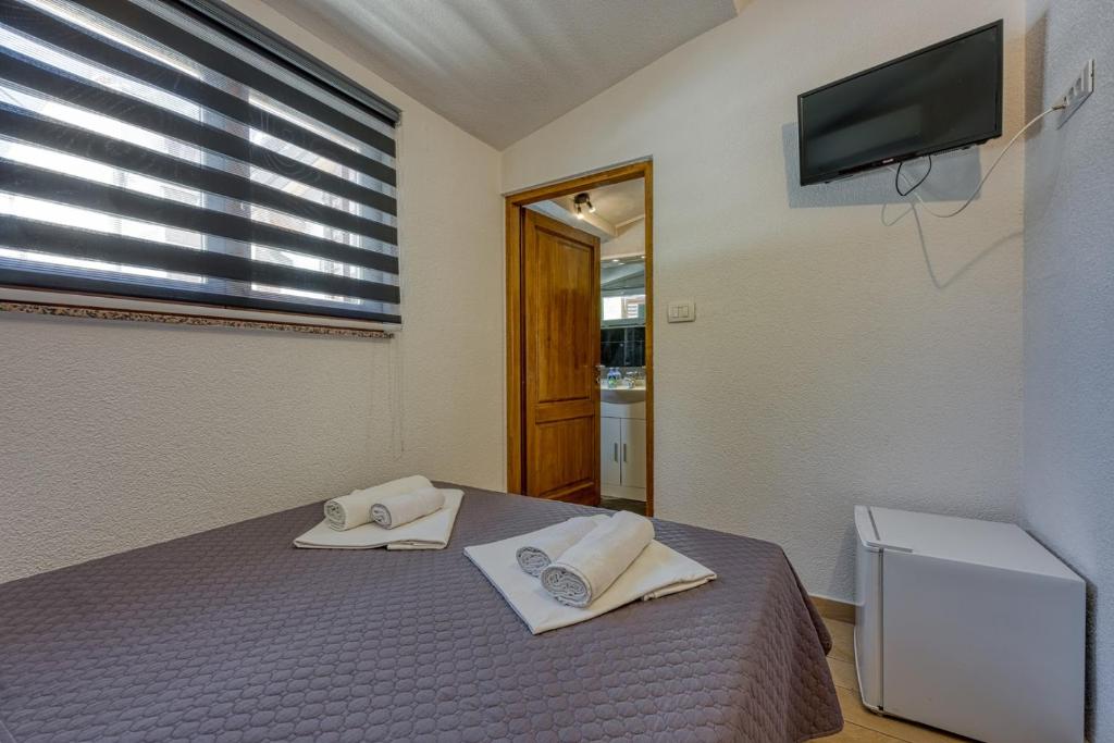 TV a/nebo společenská místnost v ubytování Stipe Rooms
