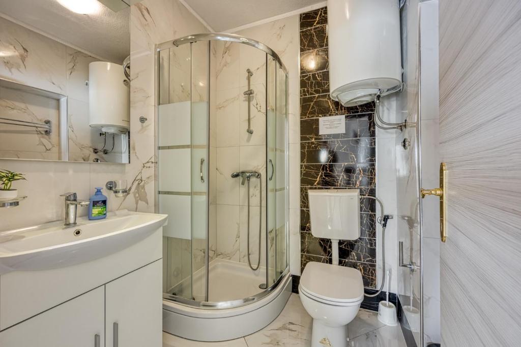 Koupelna v ubytování Stipe Rooms