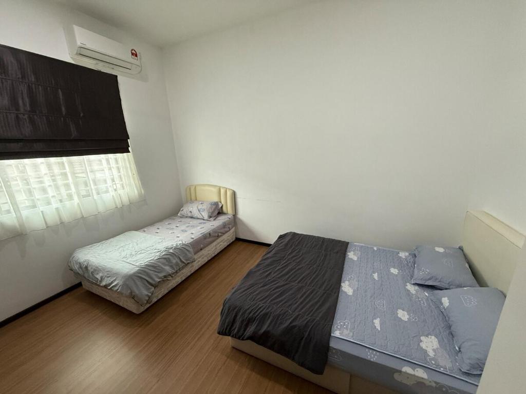 Katil atau katil-katil dalam bilik di Hello Joy 和乐居 4BR - Lopeng, Miri