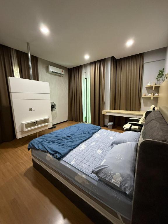 Katil atau katil-katil dalam bilik di Hello Joy 和乐居 4BR - Lopeng, Miri