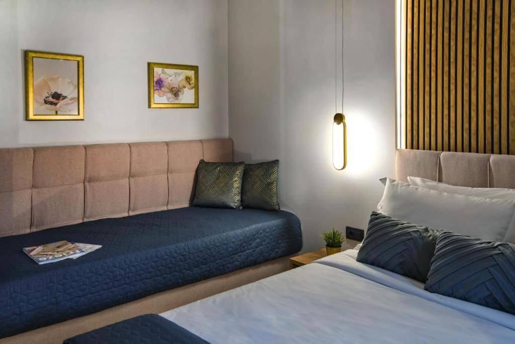 CITYLUXE Suites & Rooms - Resim 36