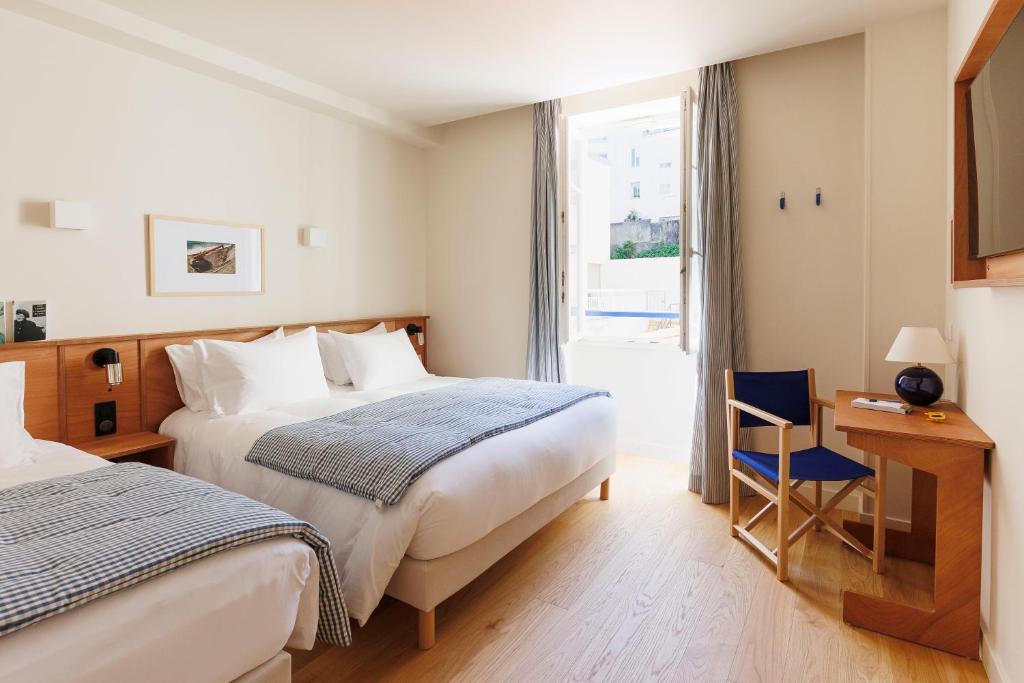 Postel nebo postele na pokoji v ubytování ALFRED HOTELS Port-Vieux