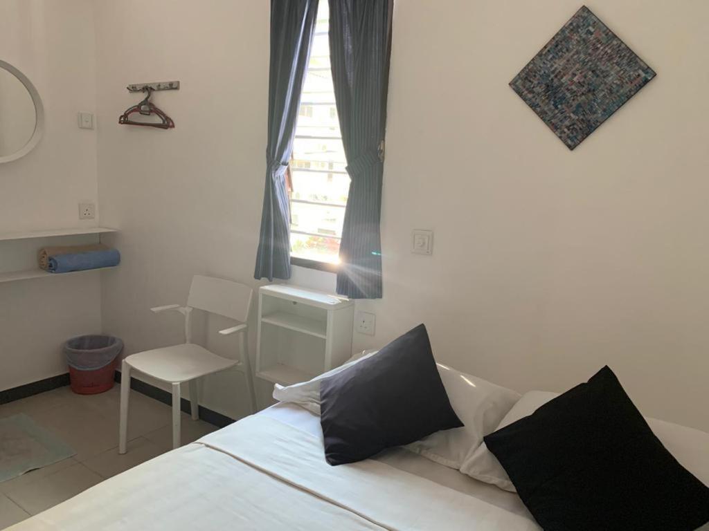 Postel nebo postele na pokoji v ubytování Nipah Bay Villa