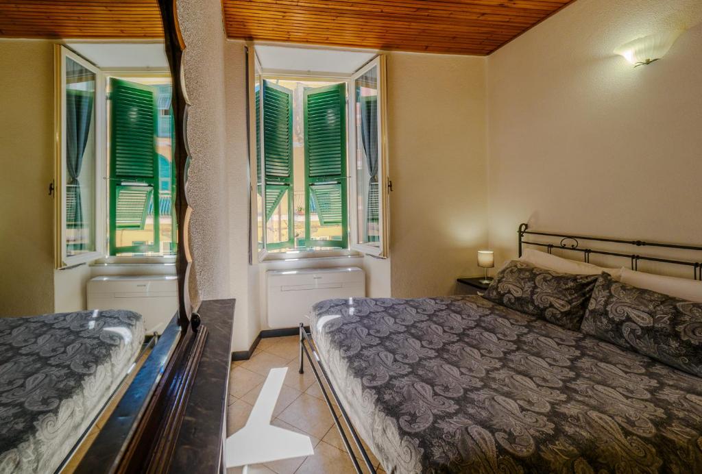 Postel nebo postele na pokoji v ubytování Macaia Room #1 with AC