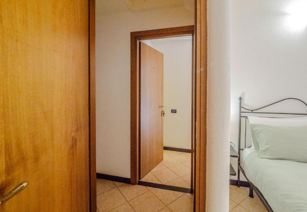 Postel nebo postele na pokoji v ubytování Macaia Room #2 with AC