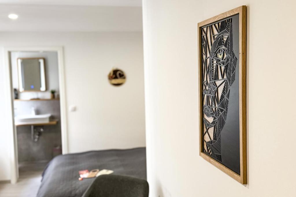 Postel nebo postele na pokoji v ubytování Pension Goldener Zwinger