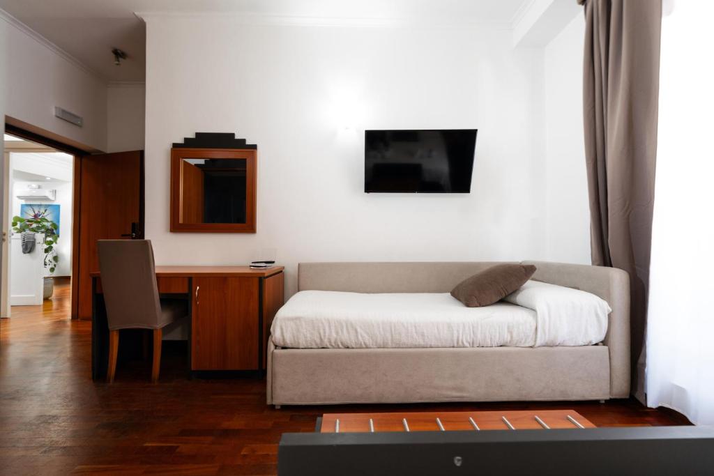 TV a/nebo společenská místnost v ubytování Hotel City Center