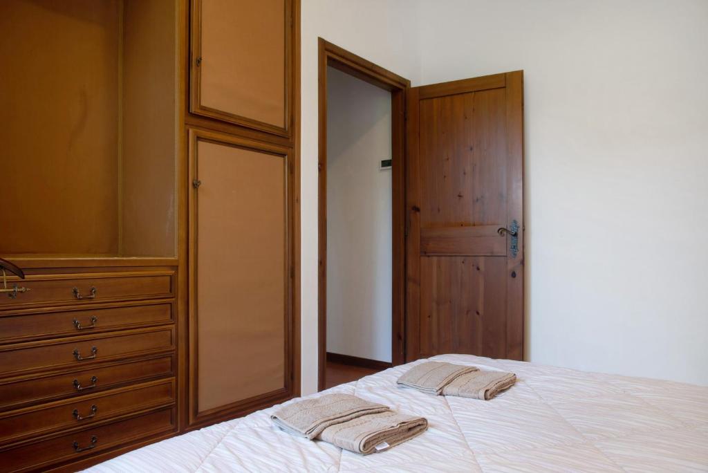 Posteľ alebo postele v izbe v ubytovaní Villa Olga Lago Maggiore