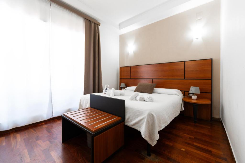 Postel nebo postele na pokoji v ubytování Hotel City Center