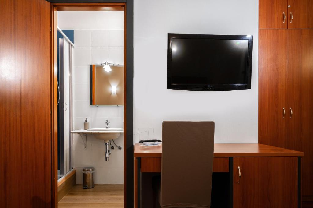 TV a/nebo společenská místnost v ubytování Hotel City Center