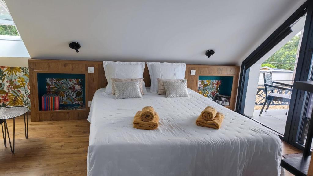 Postel nebo postele na pokoji v ubytování AMARRÉ Chambres d'Hôtes