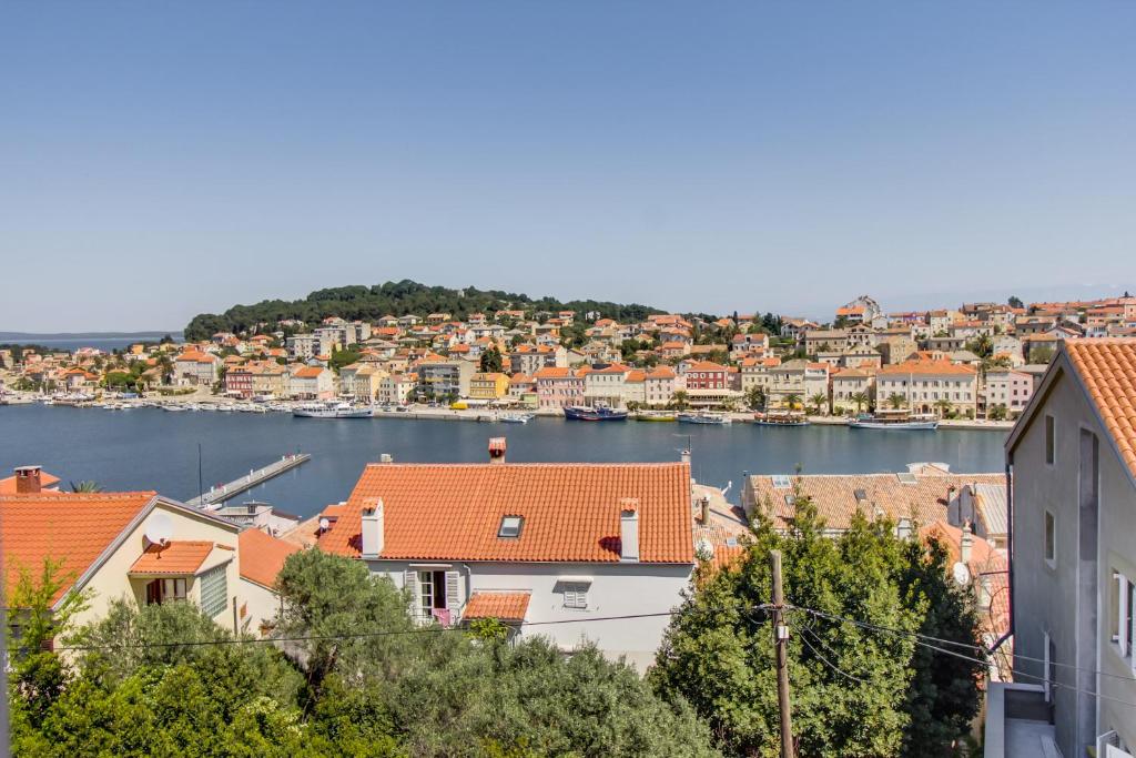 a view of a city with a harbor at Apartments Petra in Mali Lošinj