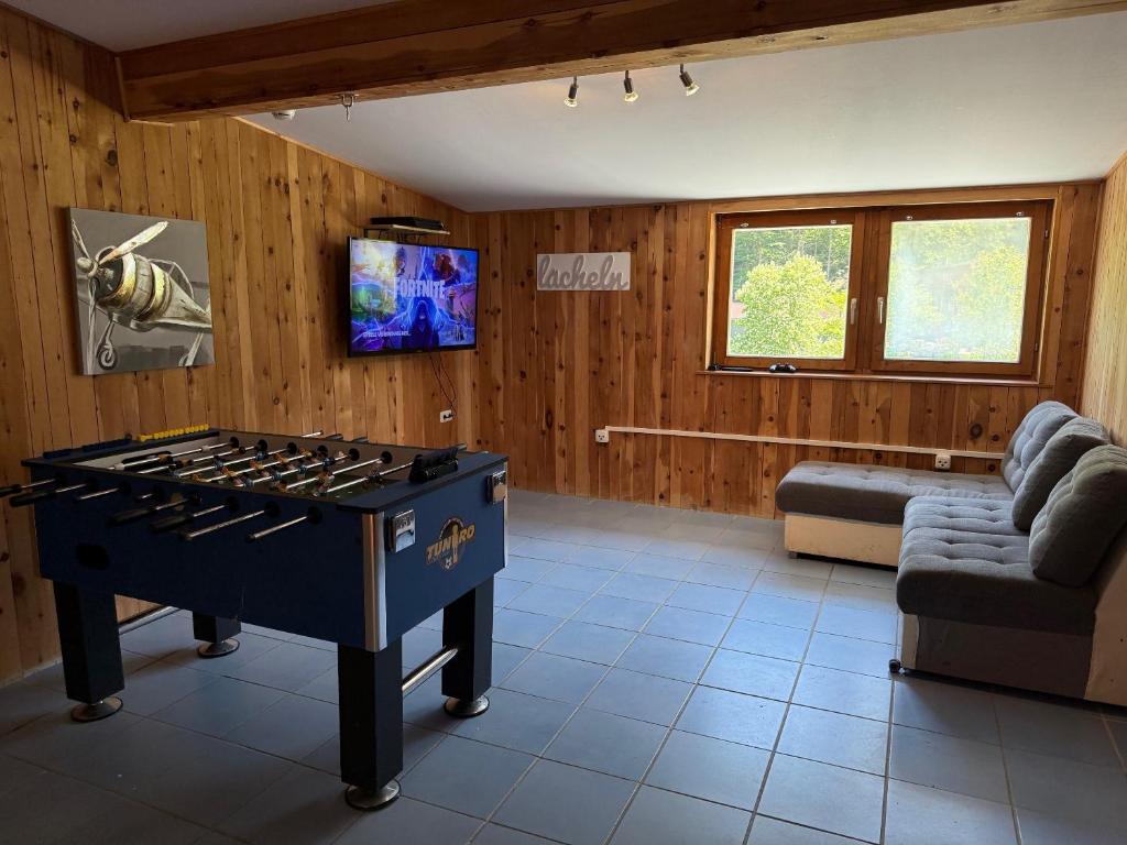 A television and/or entertainment centre at Alpenlodge, Ferienwohnung 6