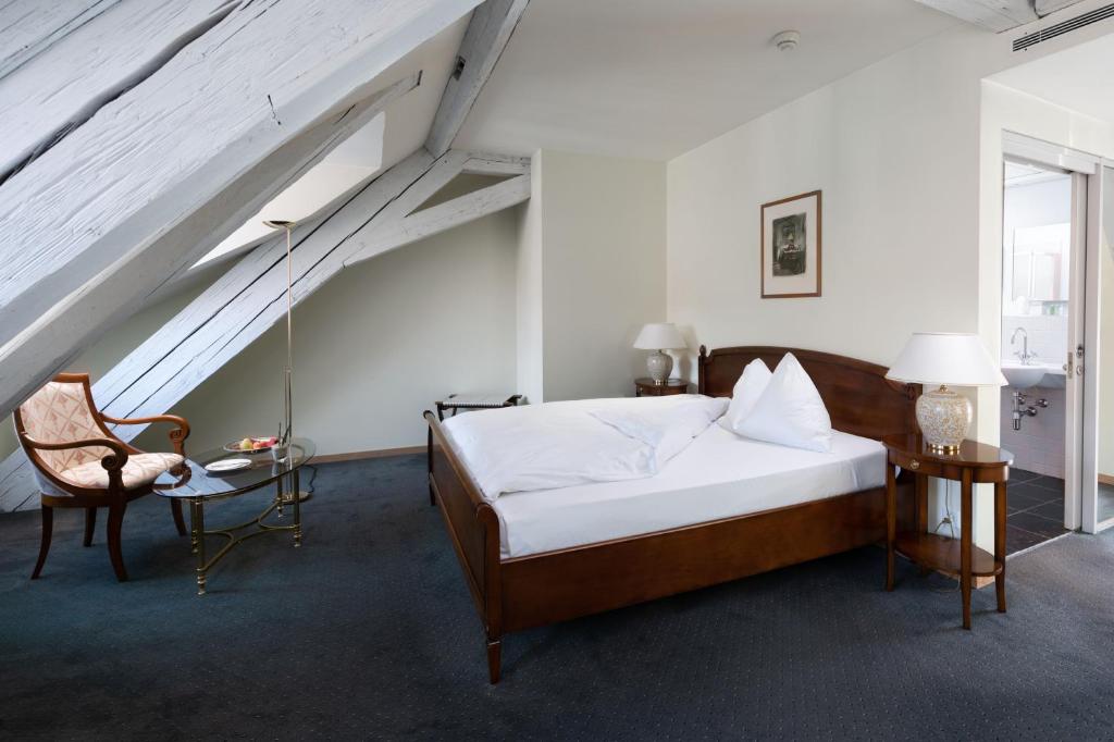 Postel nebo postele na pokoji v ubytování Hotel Stadthaus