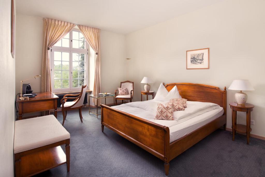 Postel nebo postele na pokoji v ubytování Hotel Stadthaus