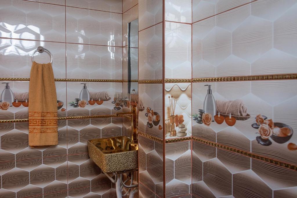 Koupelna v ubytování TRANSFER VIP HOSTEL