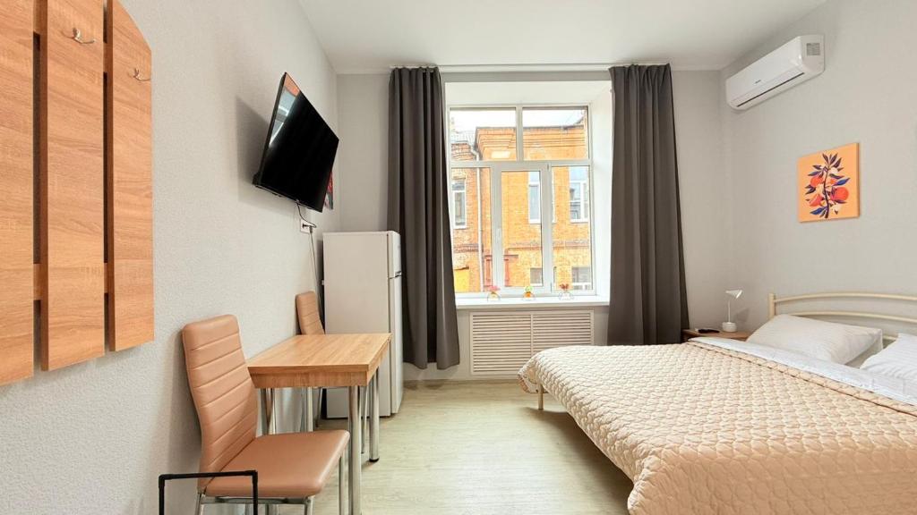 Postel nebo postele na pokoji v ubytování Centerline Apartments
