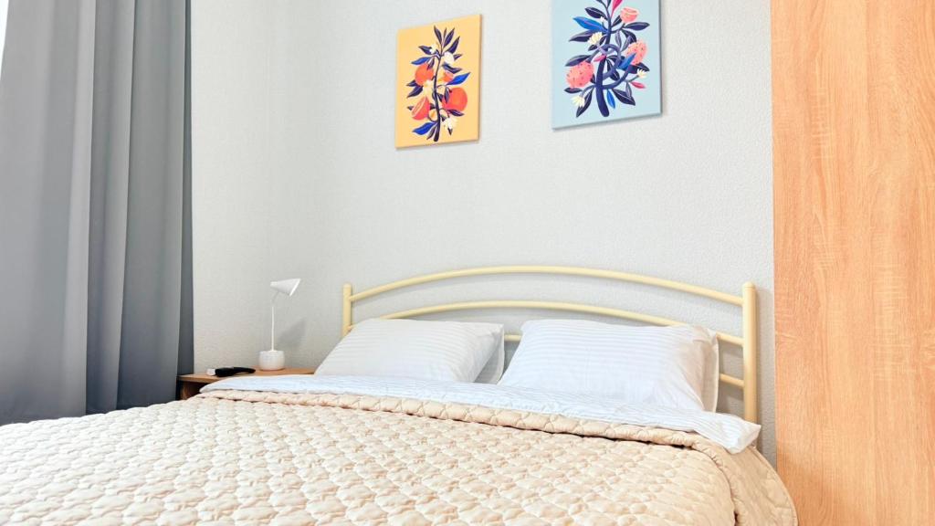 Postel nebo postele na pokoji v ubytování Centerline Apartments