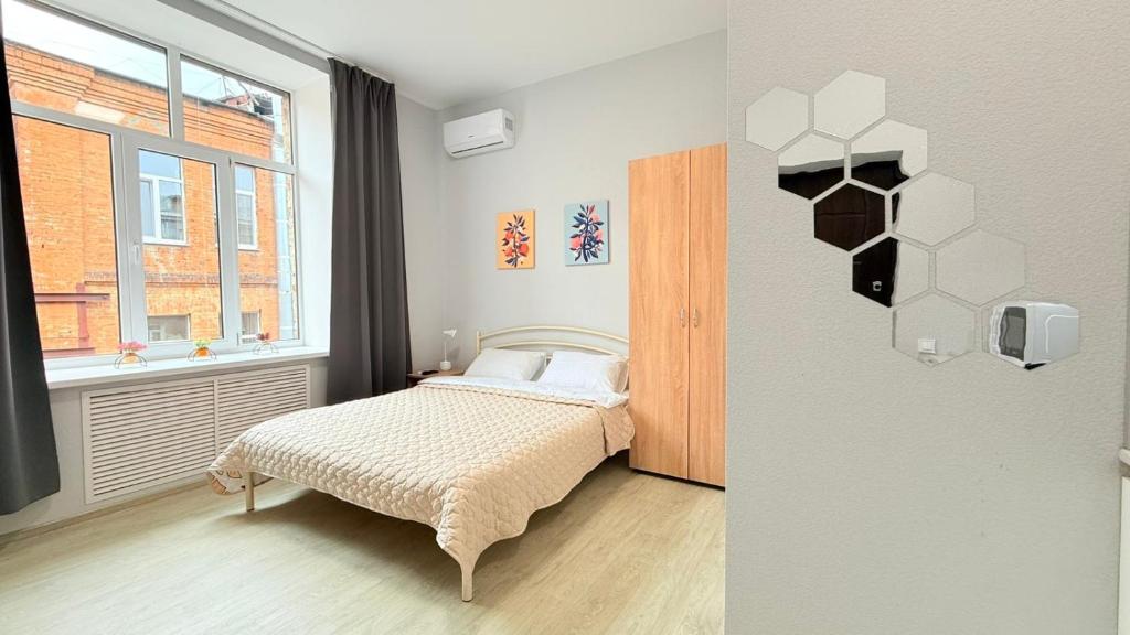 Postel nebo postele na pokoji v ubytování Centerline Apartments